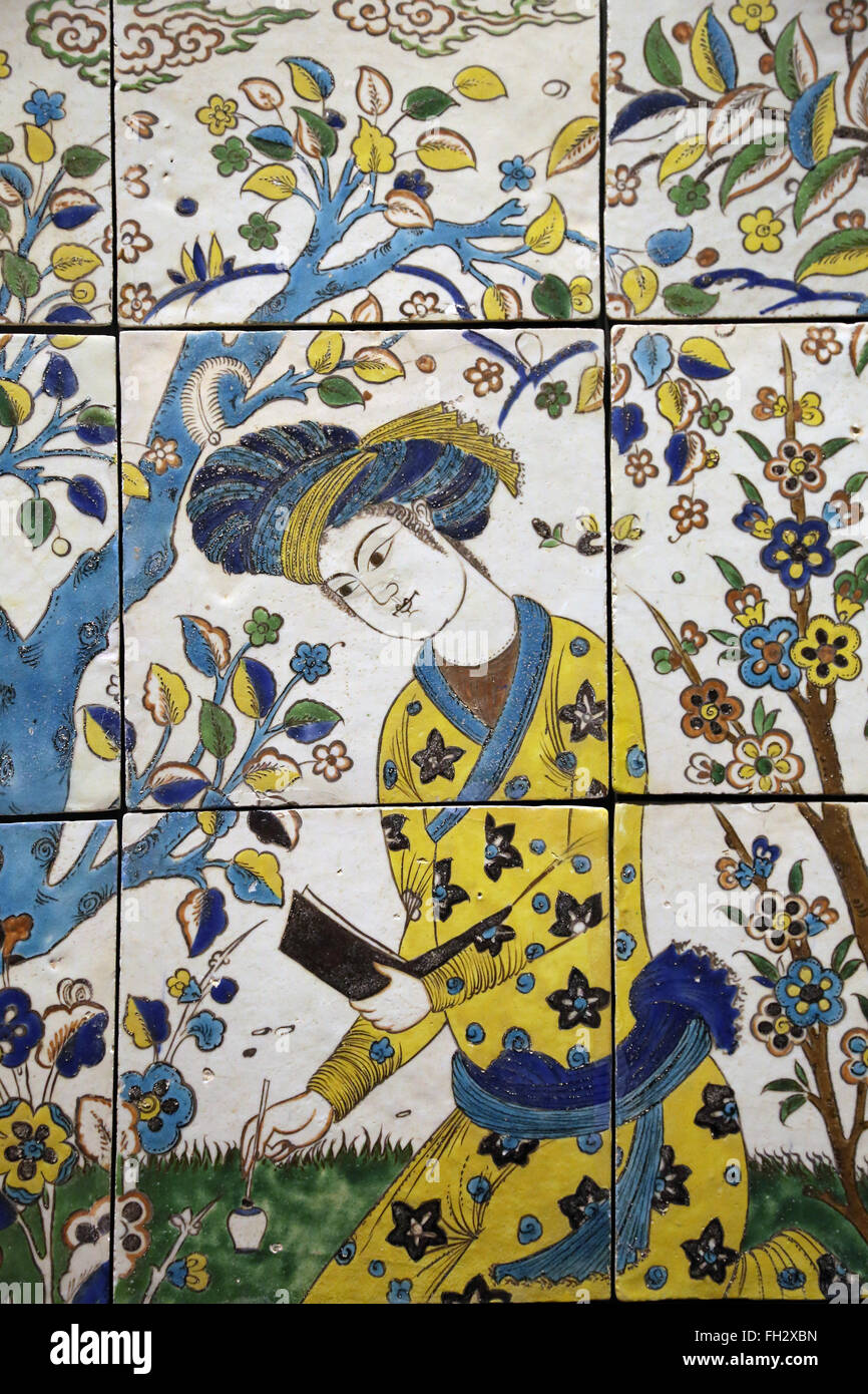 Meeting in a garden. Iran. 17th century. Colored glazed. Isfahan. Safavid period. Louvre Museum. Paris. France. Stock Photo