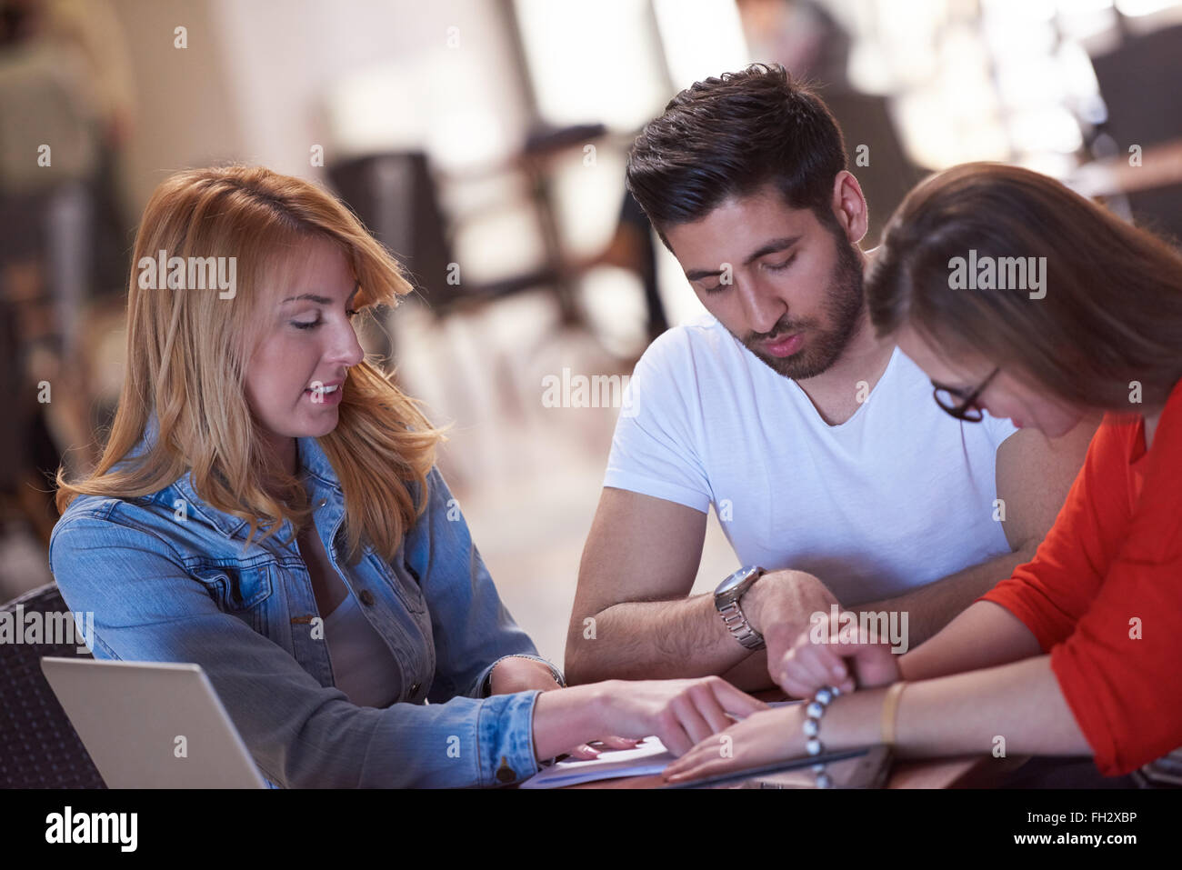 students group working on school project together Stock Photo - Alamy