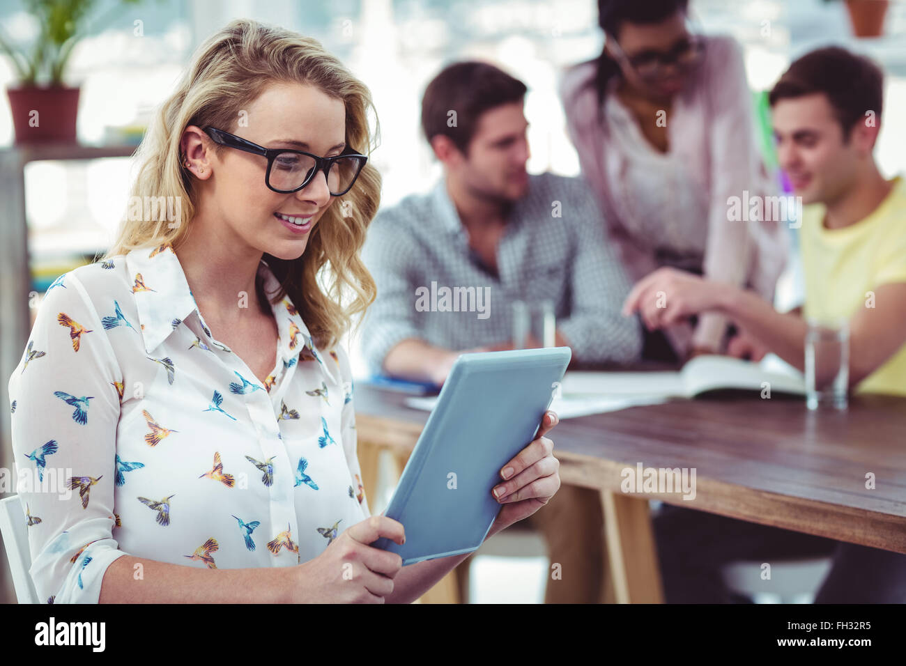 Creative business team working hard together Stock Photo - Alamy