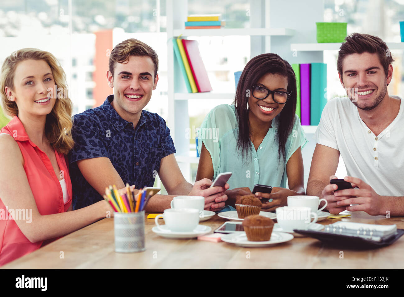 Creative team working together on a tablets and smartphones Stock Photo ...
