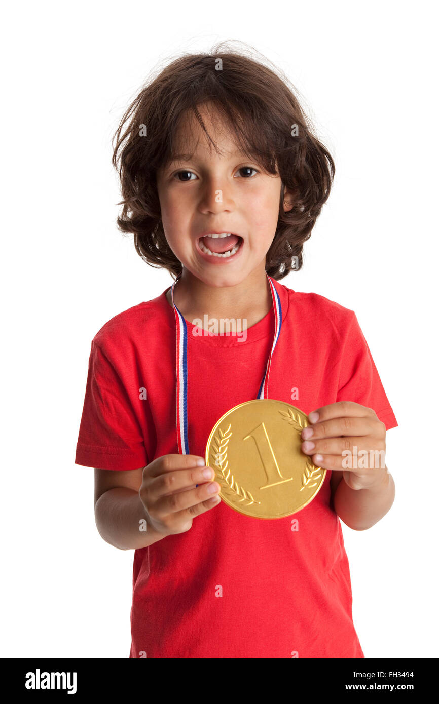 Little boy with a first place medal on white background Stock Photo