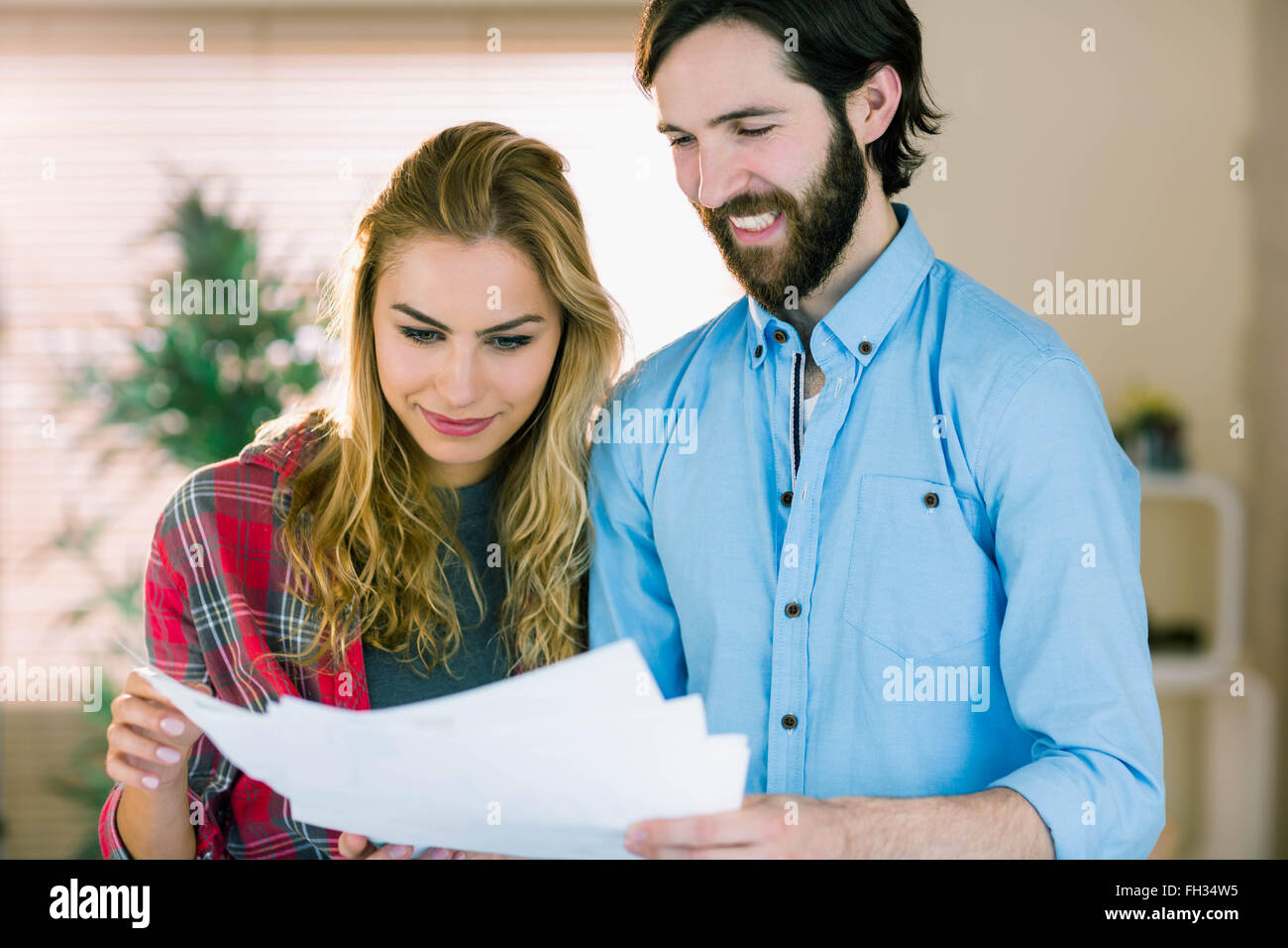 Creative team looking at their notes Stock Photo - Alamy