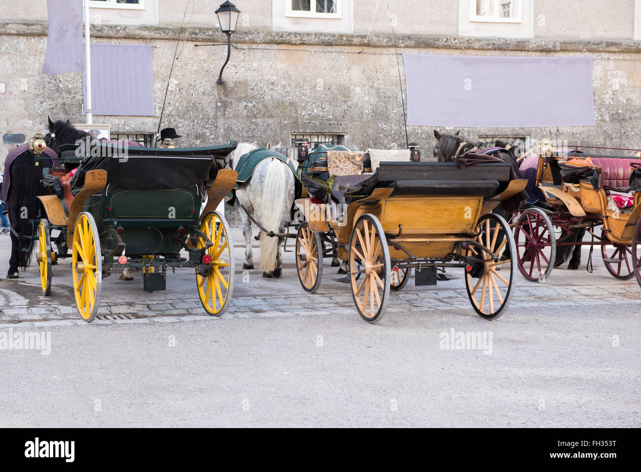 historic coaches in the historic oldtown of salzburg Stock Photo