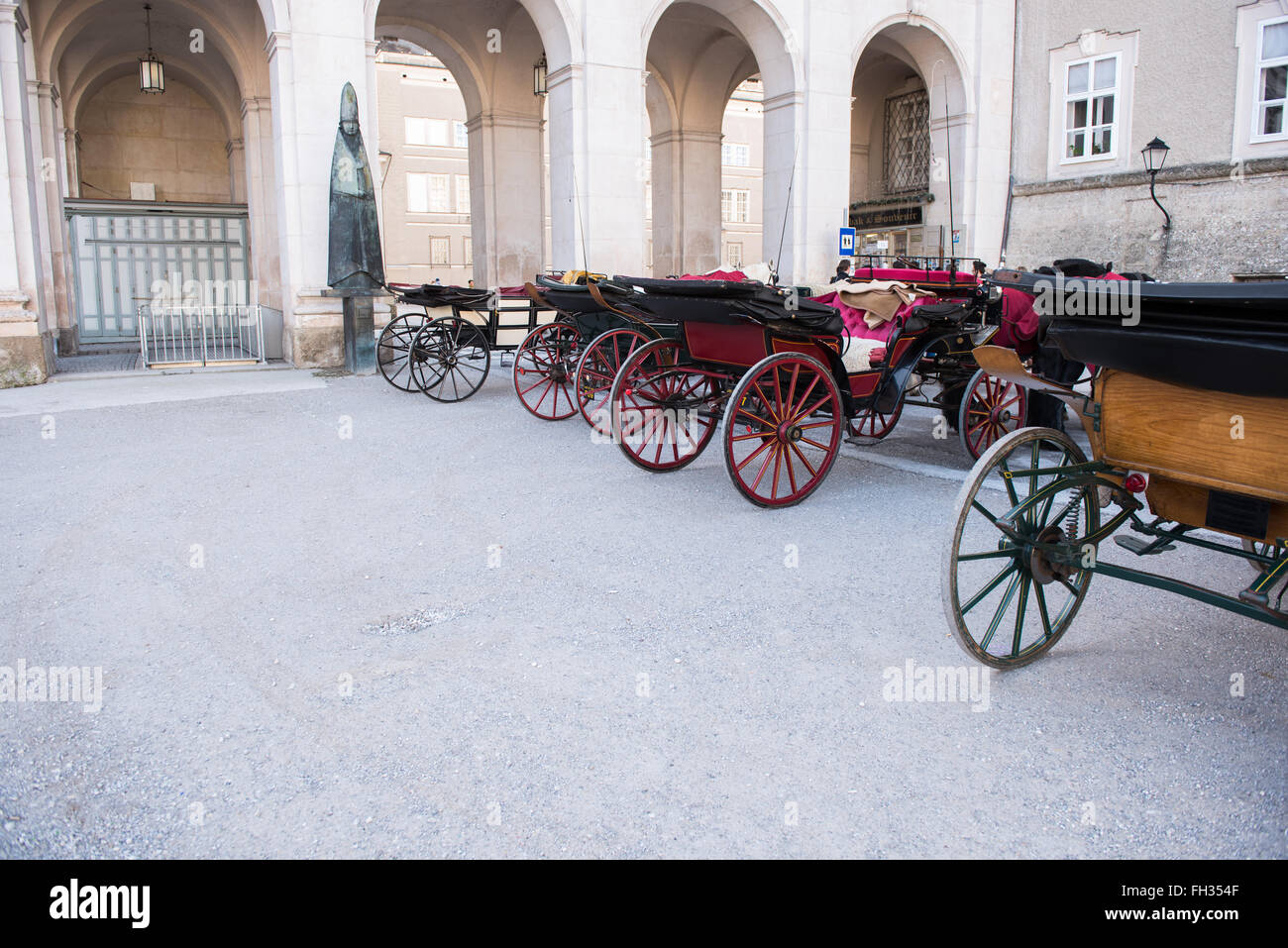 historic coaches in the historic oldtown of salzburg Stock Photo