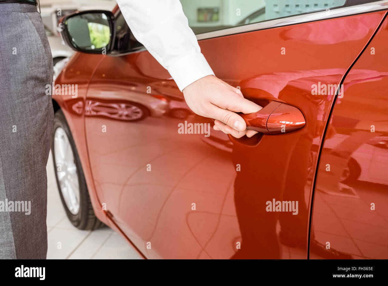 Man holding a car door handles Stock Photo Alamy