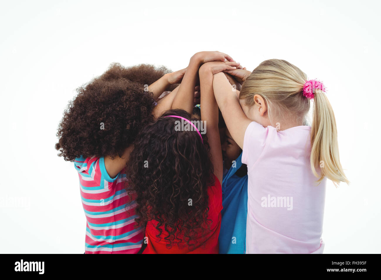 Small group of girls huddled together Stock Photo - Alamy