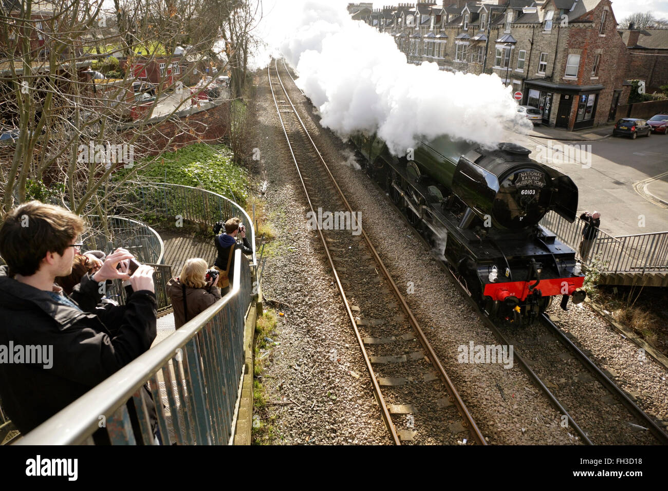York, UK. 23rd February, 2016. Newly restored LNER A3 class locomotive “Flying Scotsman” leaves York on its way to Scarborough on a final test run before its inaugural comeback journey from London King's Cross to York on Thursday 25 February. The locomotive, owned by the National Railway Museum (NRM), has been fully restored at a cost of £4.2 million and in addition to featuring in a new exhibition at the NRM's York location will be hauling special trains throughout the UK in the coming months. Credit:  david soulsby/Alamy Live News Stock Photo