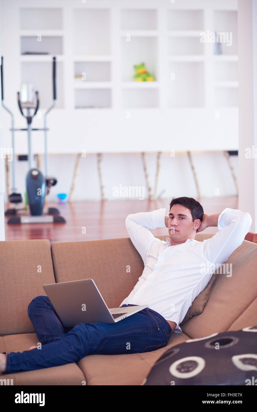 working on laptop computer from home Stock Photo - Alamy