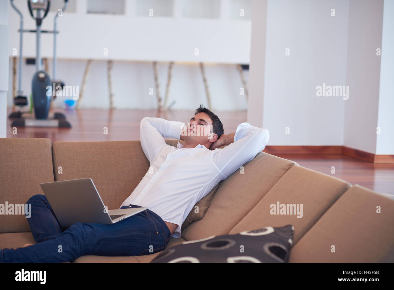 working on laptop computer from home Stock Photo - Alamy