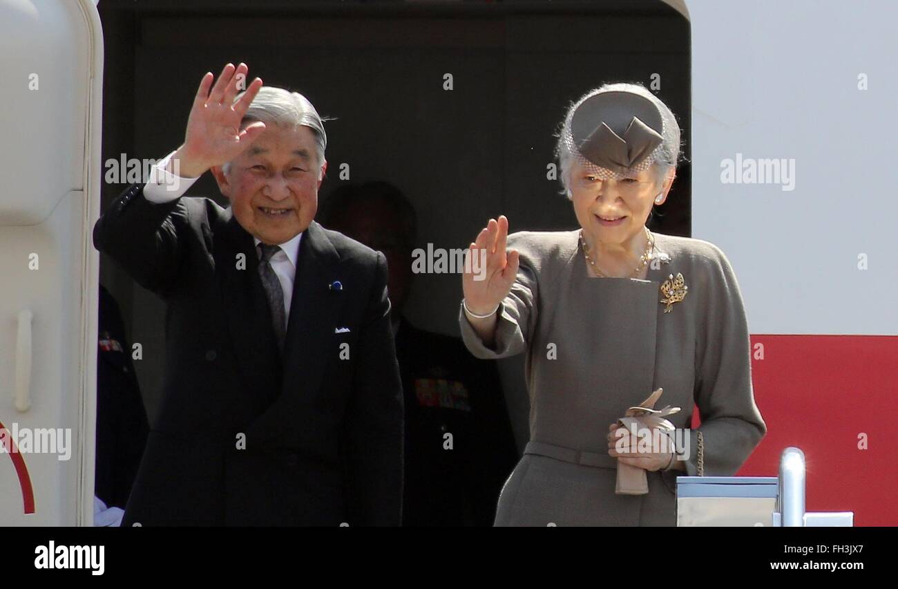 Japanese Emperor Akihito and his wife Empress Michiko wave as they board their aircraft following a five-day state visit to the Philippines at Manila International Airport January 30, 2016 in Manila, Philippines. Stock Photo