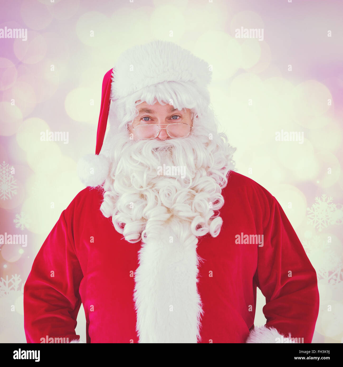 Composite image of portrait of smiling santa claus Stock Photo - Alamy