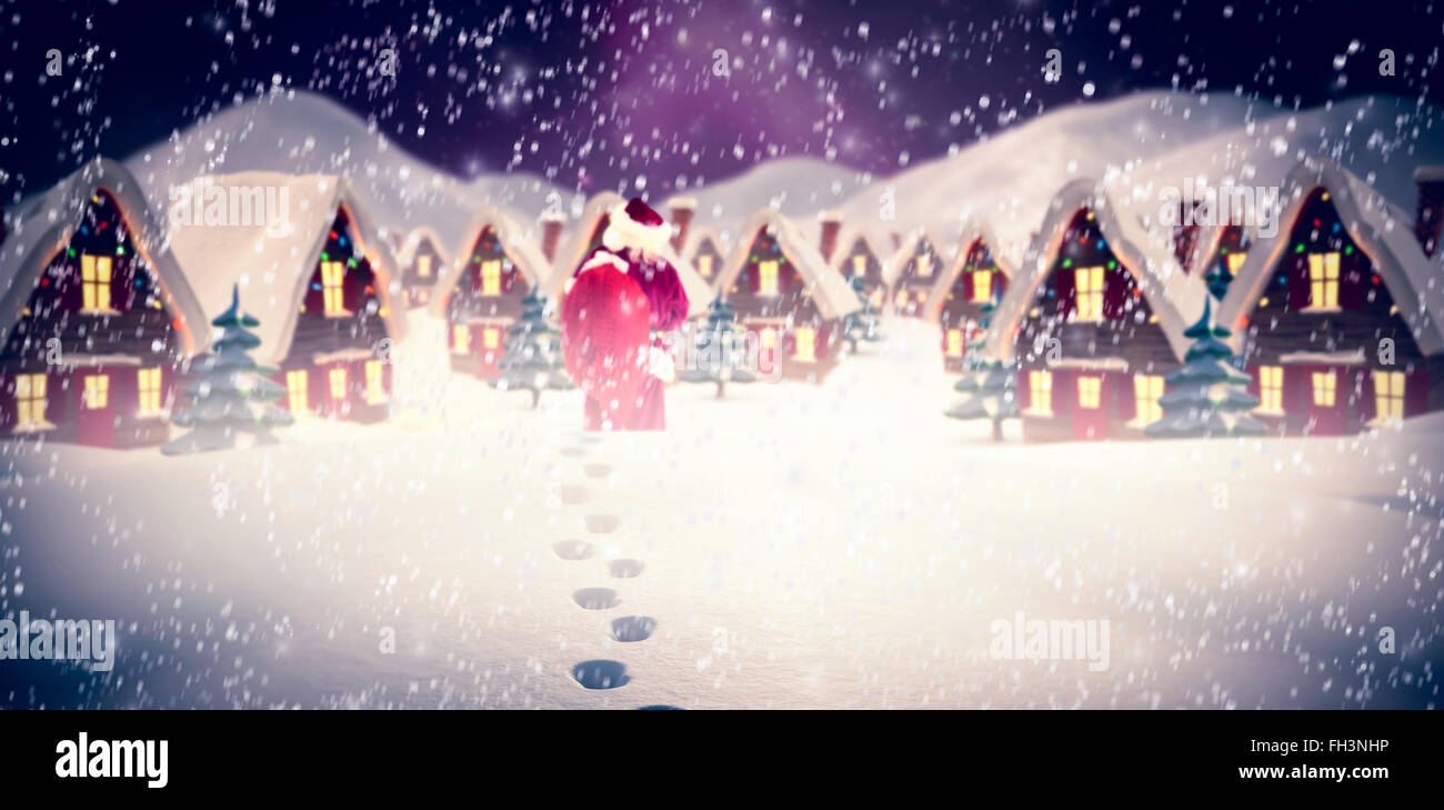 Composite image of santa is holding his bag in one hand Stock Photo - Alamy