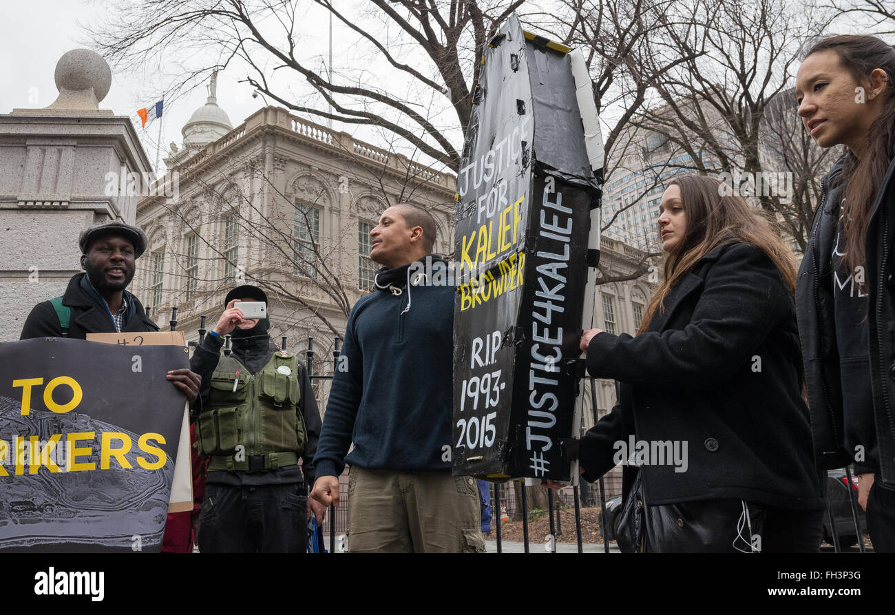 New York, United States. 23rd Feb, 2016. Demonstrators hold aloft a symbolic coffin bearing Kalief Browder's name as they rally near the gate of City Hall. A confederacy of about a dozen prison reform activists rallied at City Hall in New York City to demand that it close the long-controversial Rikers Island Corrections facility where, among others, Kalief Browder, died; critics maintain that the prison is unsafe and prolonged detention of inmates at the facility is a violation of Constitutional due process rights. Credit:  Albin Lohr-Jones/Pacific Press/Alamy Live News Stock Photo