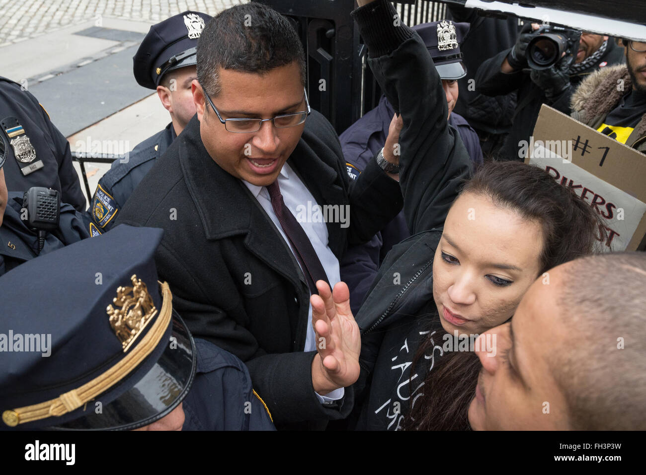 New York, United States. 23rd Feb, 2016. Demonstrators carrying aloft a symbolic coffin are forcibly turned back by City Hall security officers as they attempt to enter. A confederacy of about a dozen prison reform activists rallied at City Hall in New York City to demand that it close the long-controversial Rikers Island Corrections facility where, among others, Kalief Browder, died; critics maintain that the prison is unsafe and prolonged detention of inmates at the facility is a violation of Constitutional due process rights. Credit:  Albin Lohr-Jones/Pacific Press/Alamy Live News Stock Photo