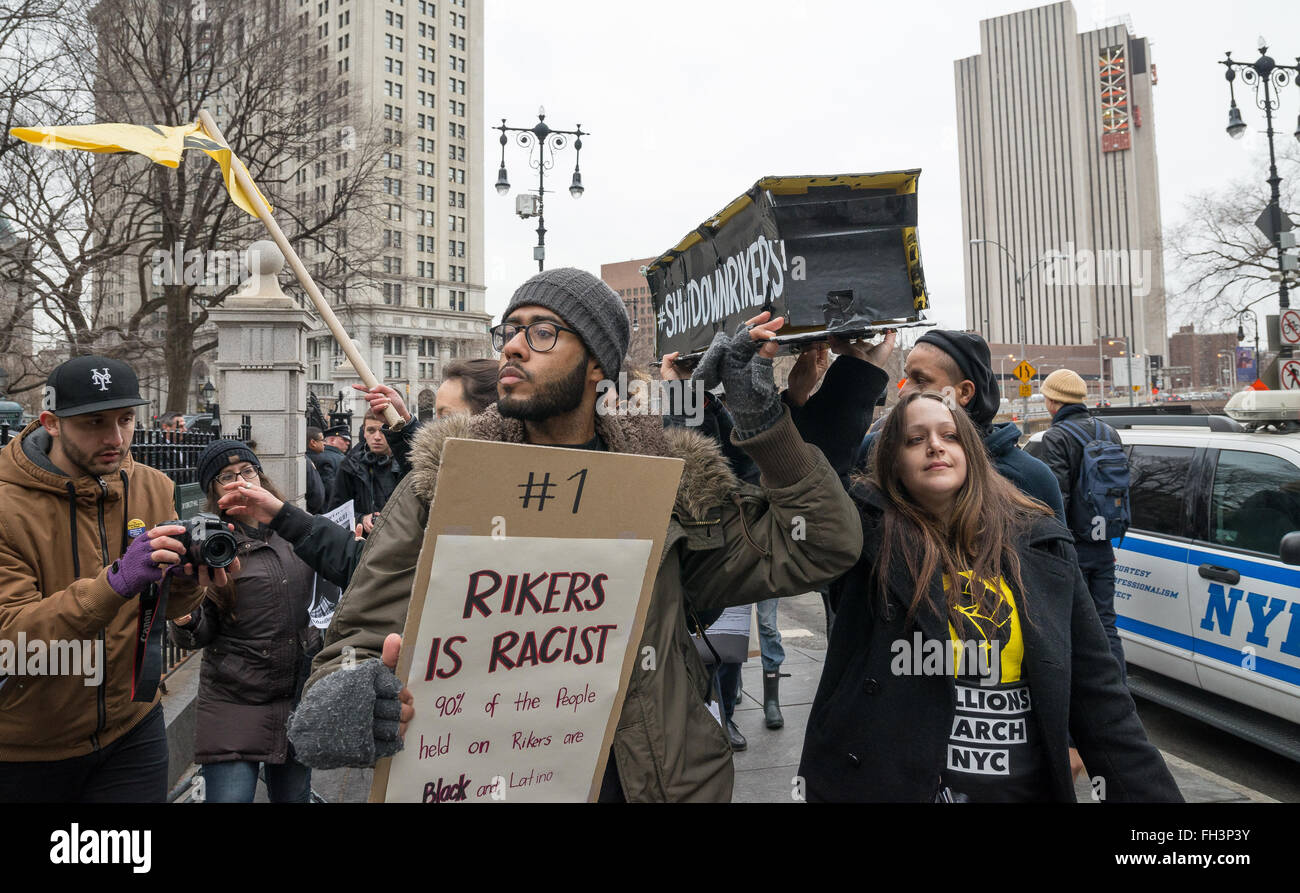 New York, United States. 23rd Feb, 2016. Demonstrators carry aloft a ...