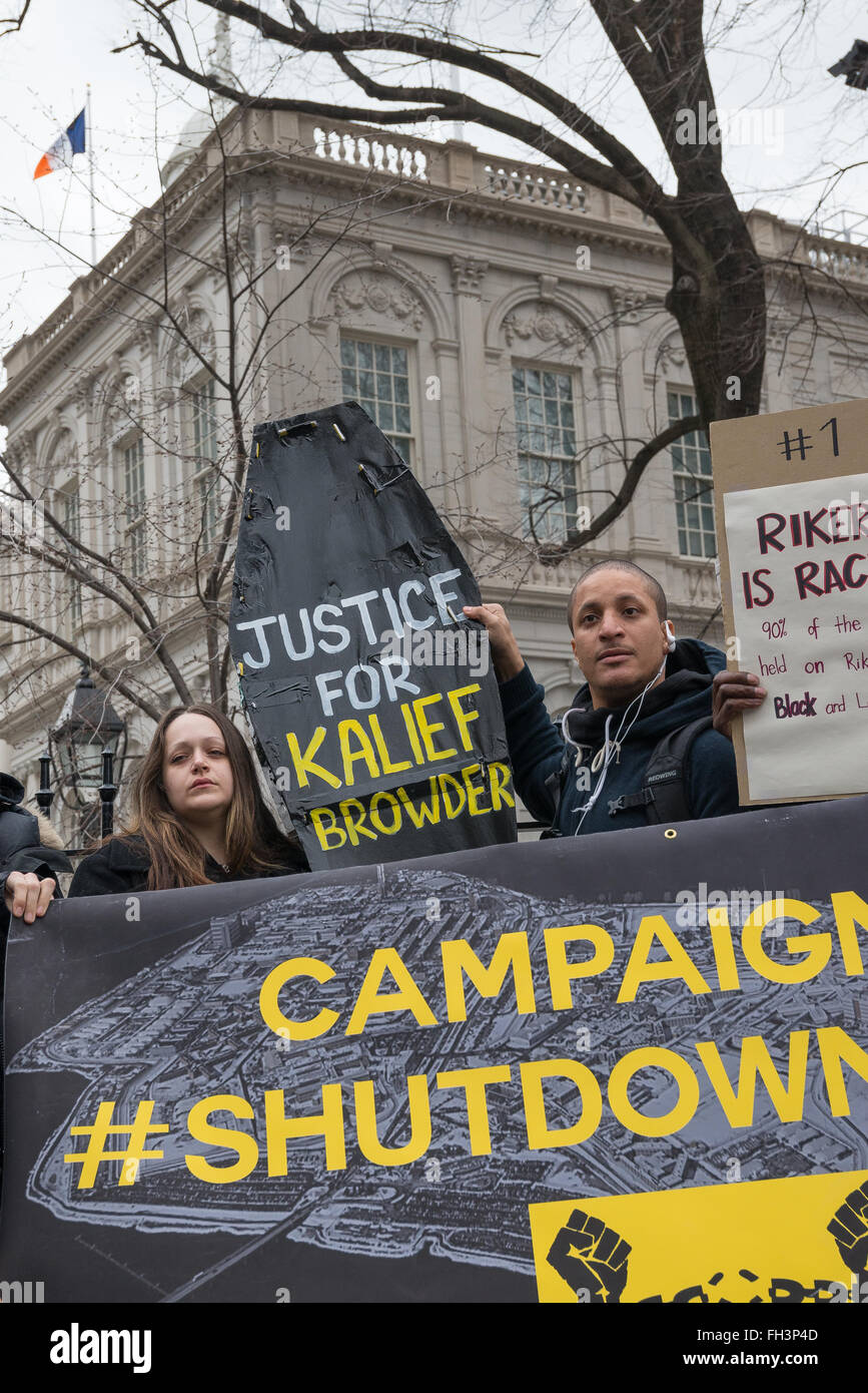 New York, United States. 23rd Feb, 2016. Demonstrators hold aloft a symbolic coffin bearing Kalief Browder's name as they rally near the gate of City Hall. A confederacy of about a dozen prison reform activists rallied at City Hall in New York City to demand that it close the long-controversial Rikers Island Corrections facility where, among others, Kalief Browder, died; critics maintain that the prison is unsafe and prolonged detention of inmates at the facility is a violation of Constitutional due process rights. Credit:  Albin Lohr-Jones/Pacific Press/Alamy Live News Stock Photo
