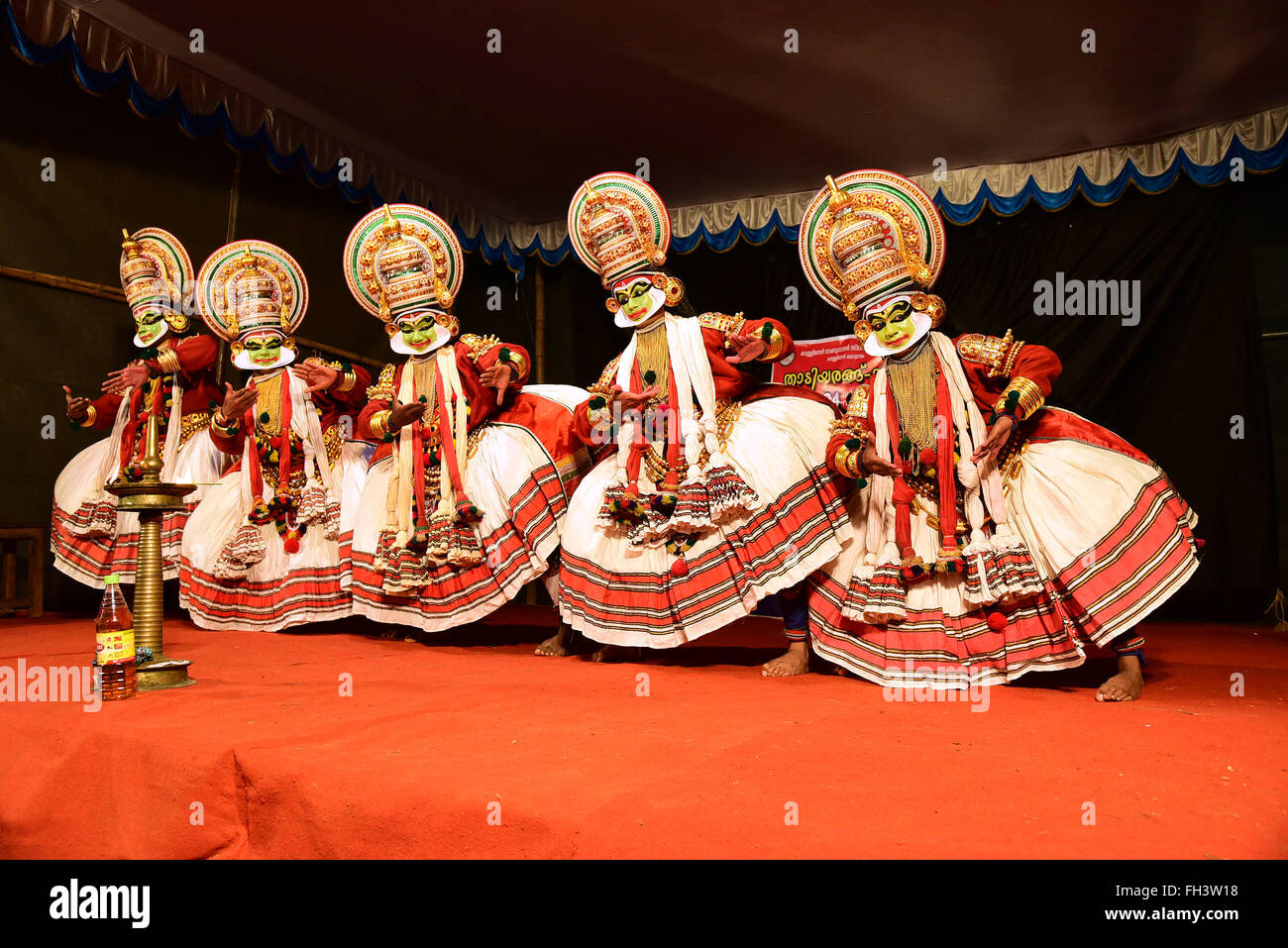 Kathakali is a stylized classical Indian dance-drama noted for the attractive make-up of characters, elaborate costumes, detaile Stock Photo