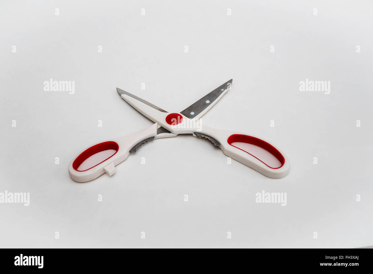 Red scissors hi-res stock photography and images - Alamy