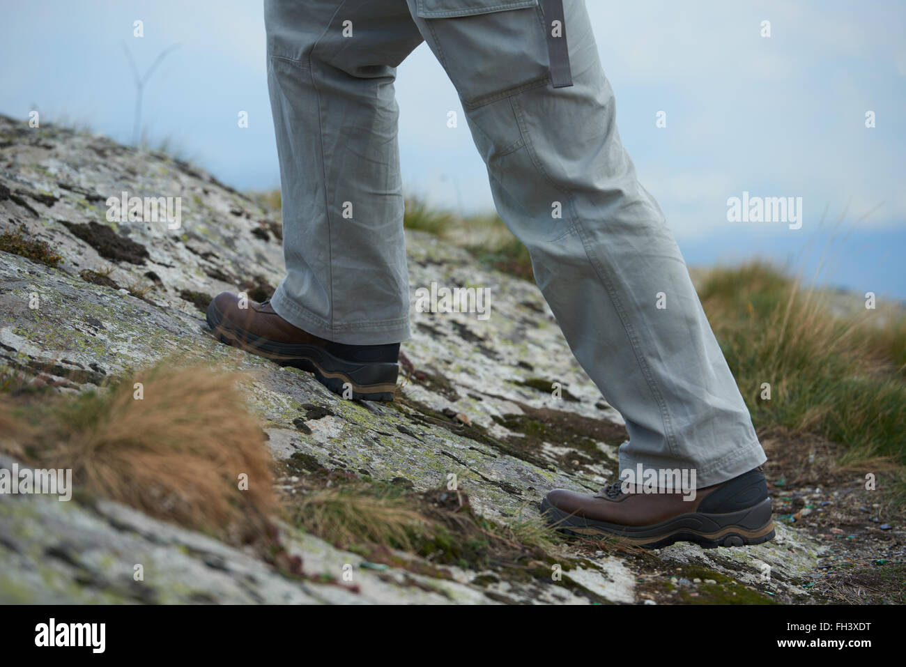 hiking man with trekking boots Stock Photo