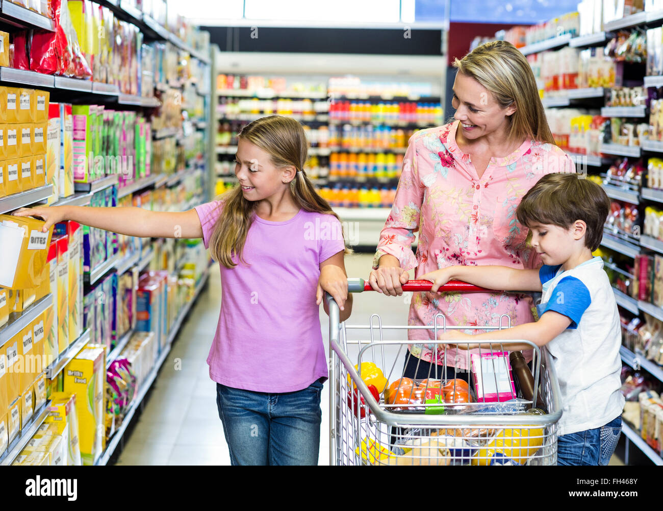 Kids supermarket holding shopping list hi-res stock photography