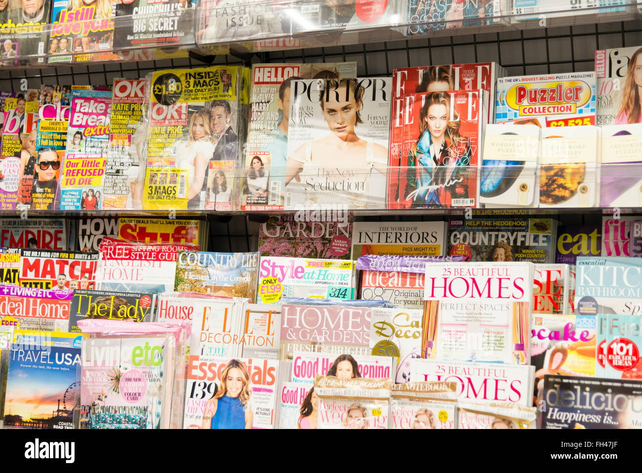 Magazines for sale in a store, UK. Stock Photo