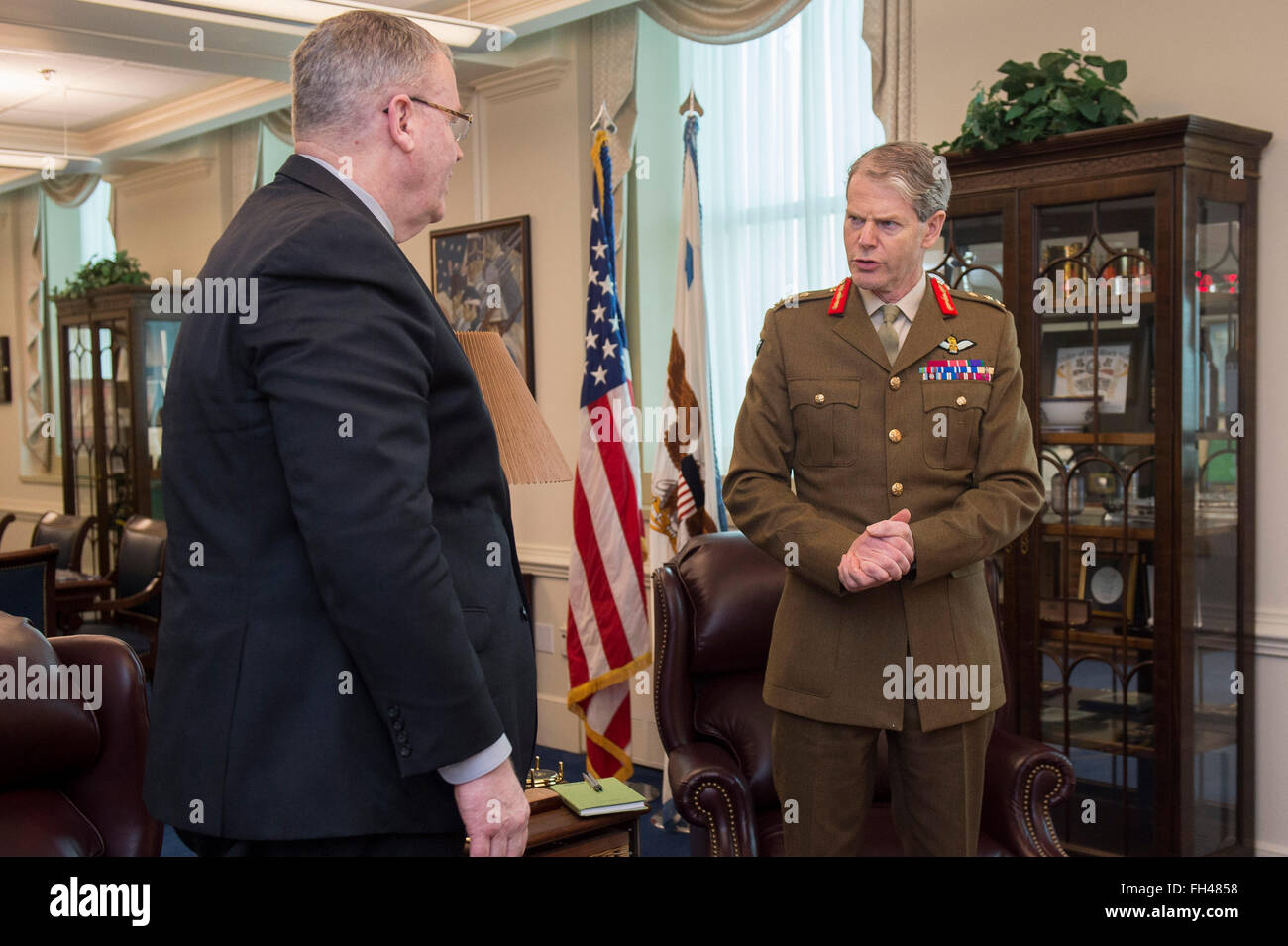 Deputy Secretary of Defense Bob Work meets with Deputy Supreme Allied Commander Europe General Sir Adrian Bradshaw at the Pentagon, Feb. 22, 2016, to discuss matters of mutual importance. Stock Photo