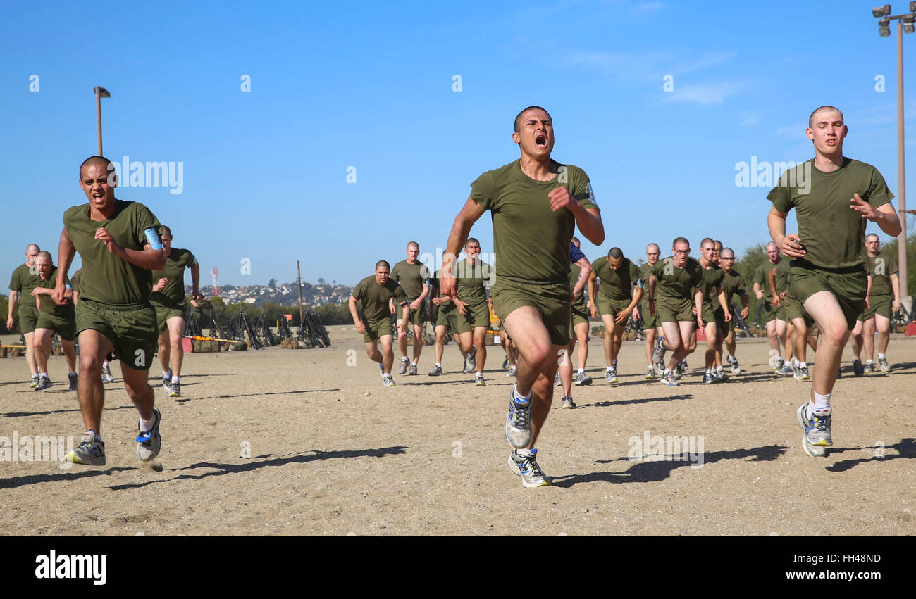 Recruits of Kilo Company, 3rd Recruit Training Battalion, conduct sprint drills during a physical training session at Marine Corps Recruit Depot San Diego, Feb. 22. Each physical training session is set to build recruits’ endurance and stamina as they progress through training. Annually, more than 17,000 males recruited from the Western Recruiting Region are trained at MCRD San Diego. Kilo Company is scheduled to graduate May 6. Stock Photo