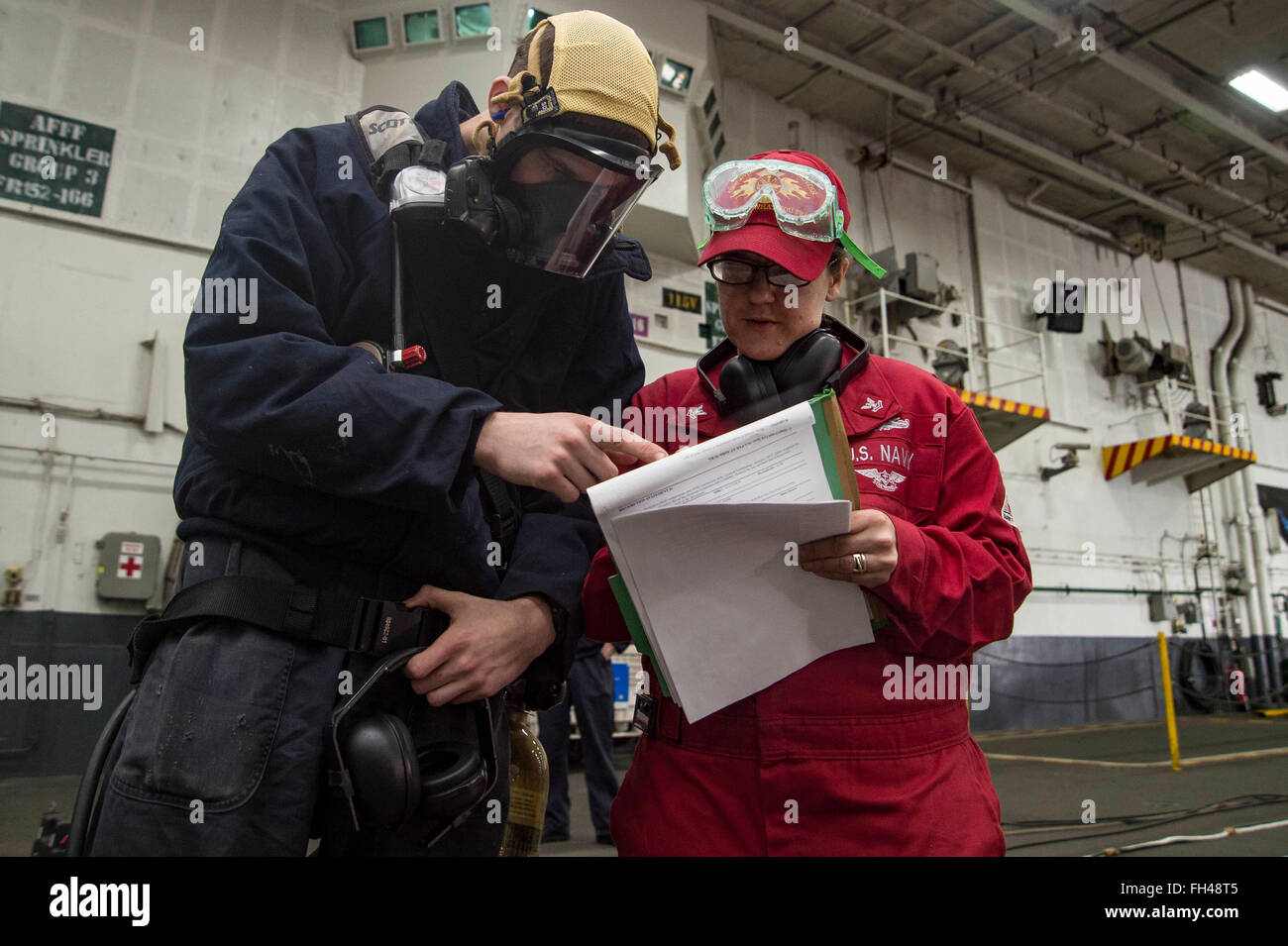 Damage Controlman 2nd Class Elizabeth Lucci and Fireman Austin ...
