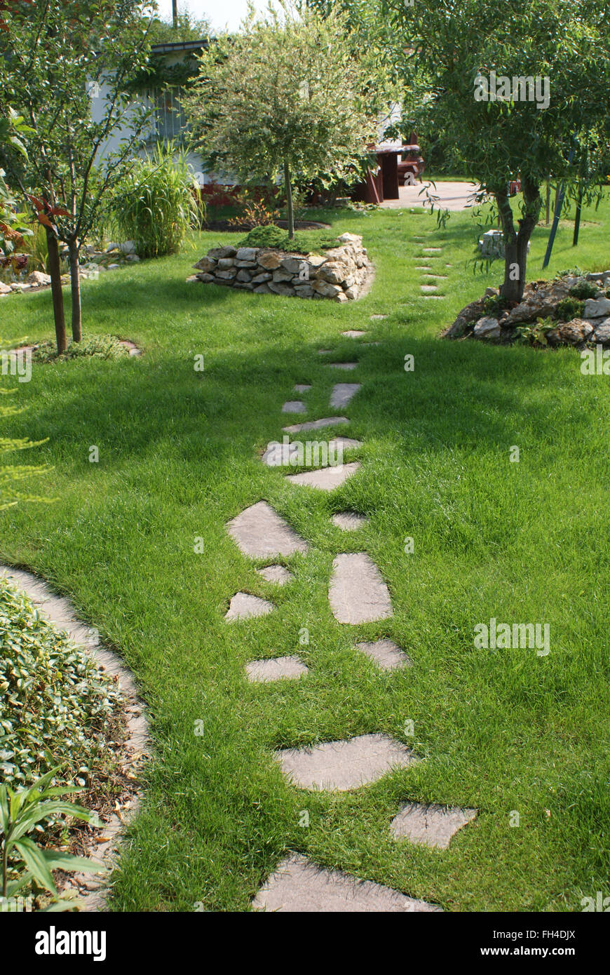 Stone-way in lawn Stock Photo