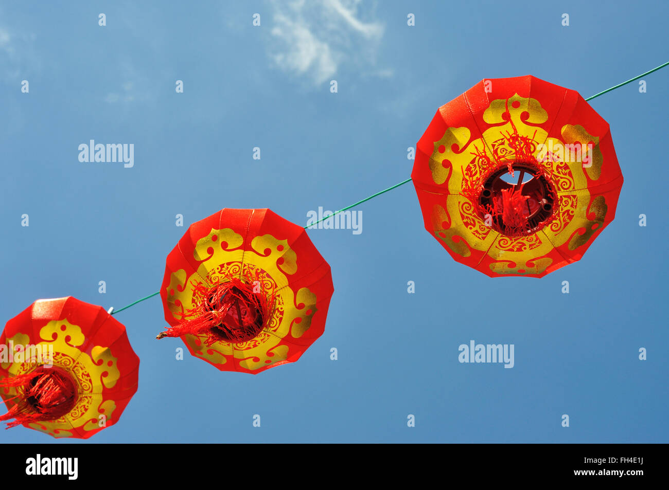 Red Chinese lantern against blue sky Stock Photo - Alamy