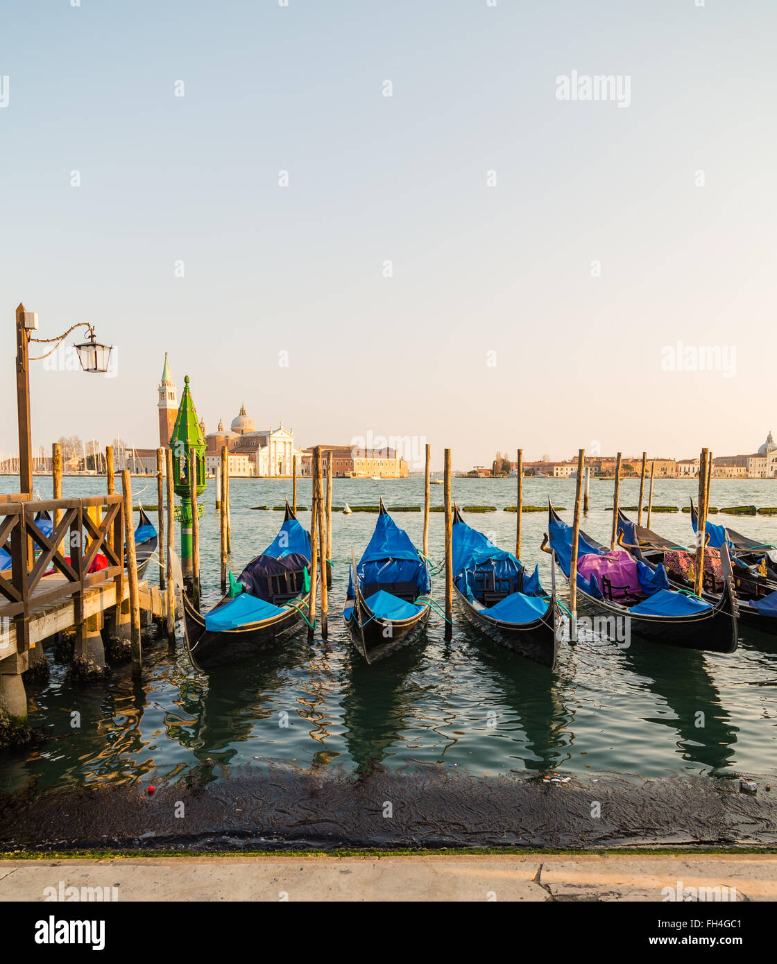 The Church of San Giorgio Maggiore from the San Marco district in Venice with Gondolas in the foreground Stock Photo