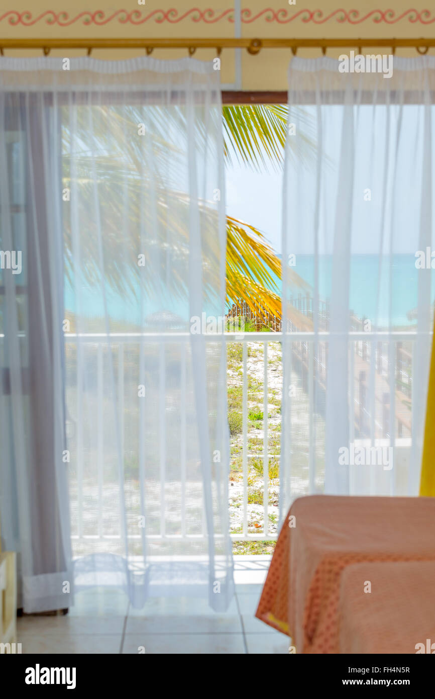 Sea view through white curtains Stock Photo Alamy