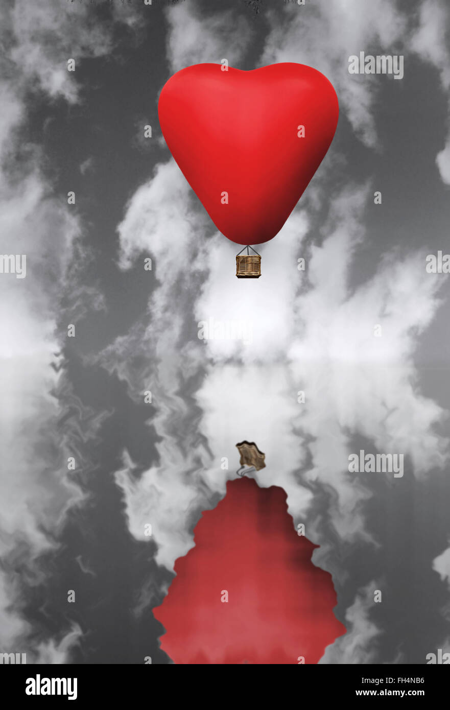 Red hot air balloon in flight against a black and white sky Stock Photo