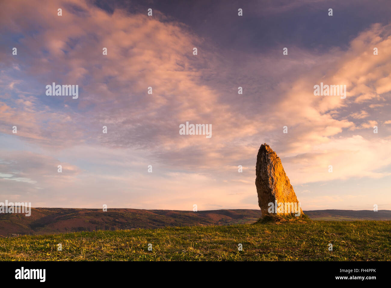 Menhir on the hill at sunset in Morinka village, Czech Republic Stock Photo