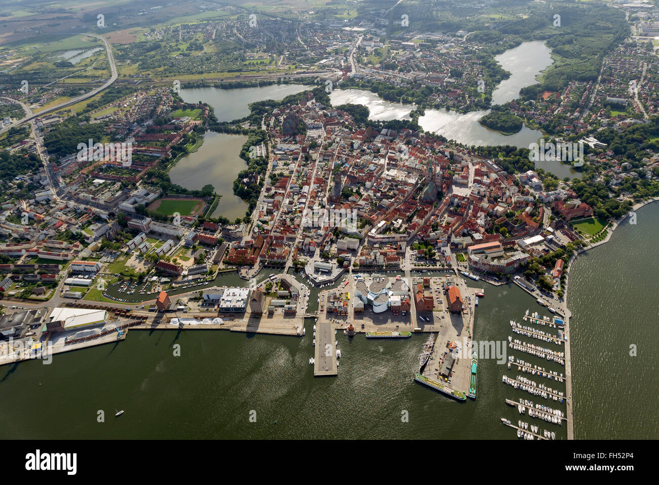 Aerial view, harbor, marina, with the German Oceanographic Museum and Ozeaneum, Stralsund, with the moated city island Stock Photo
