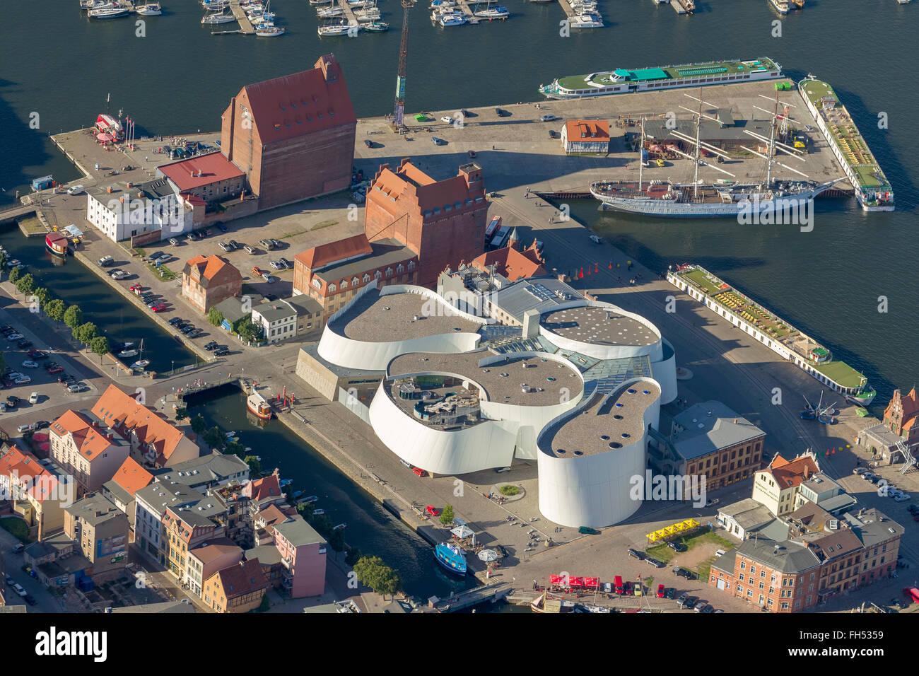 Aerial view, harbor, marina with the German Oceanographic Museum and Ozeaneum, Stralsund, with the moated city island Stock Photo