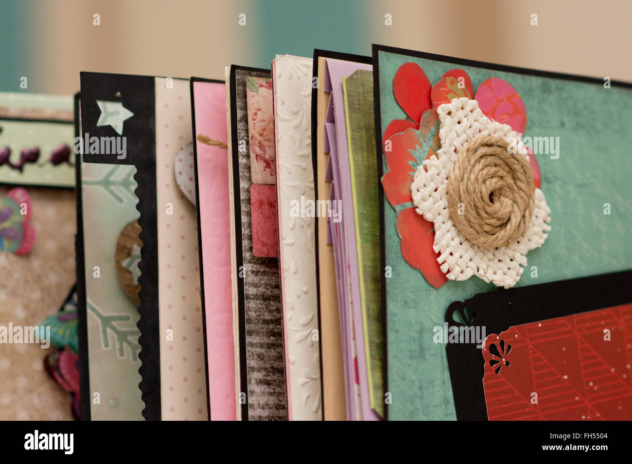 Scrapbook that was handmade by a mother to her daughter to put all her memories and photographs in one place, beautiful craft bo Stock Photo