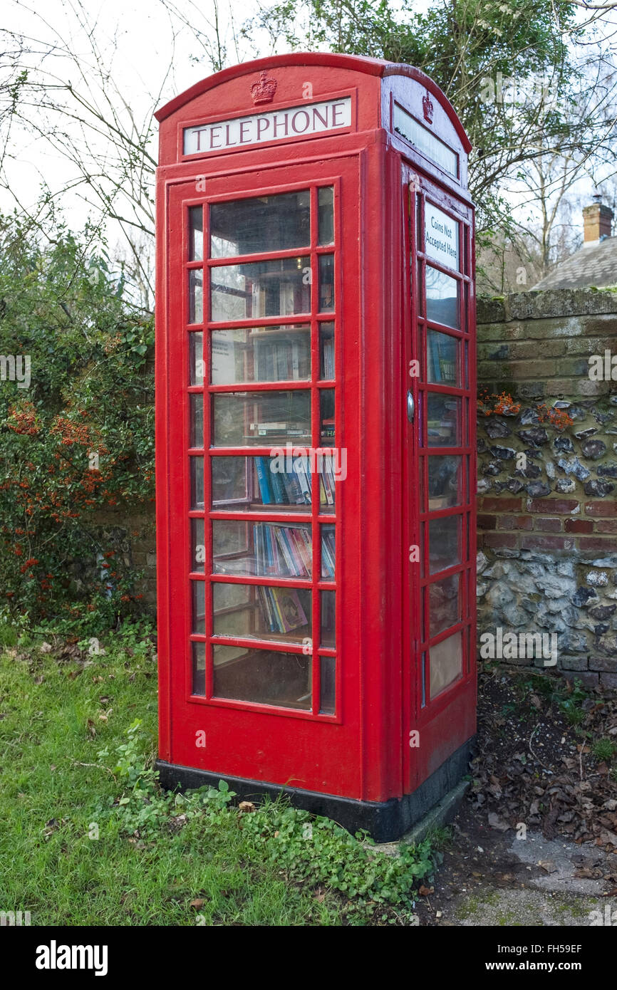 Phone box library in Over Wallop Hampshire UK Stock Photo