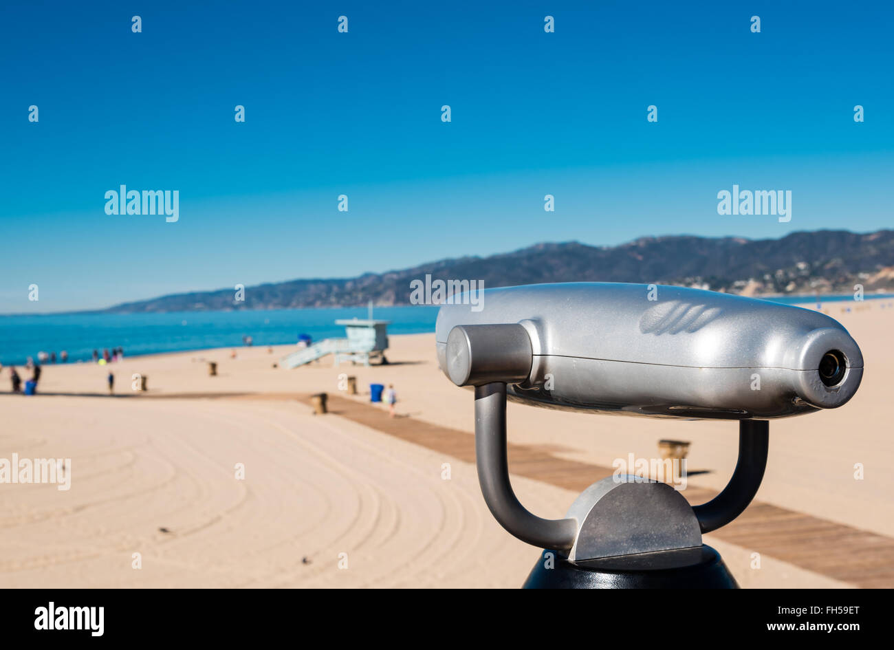 coin operated binoculars on a beach Stock Photo