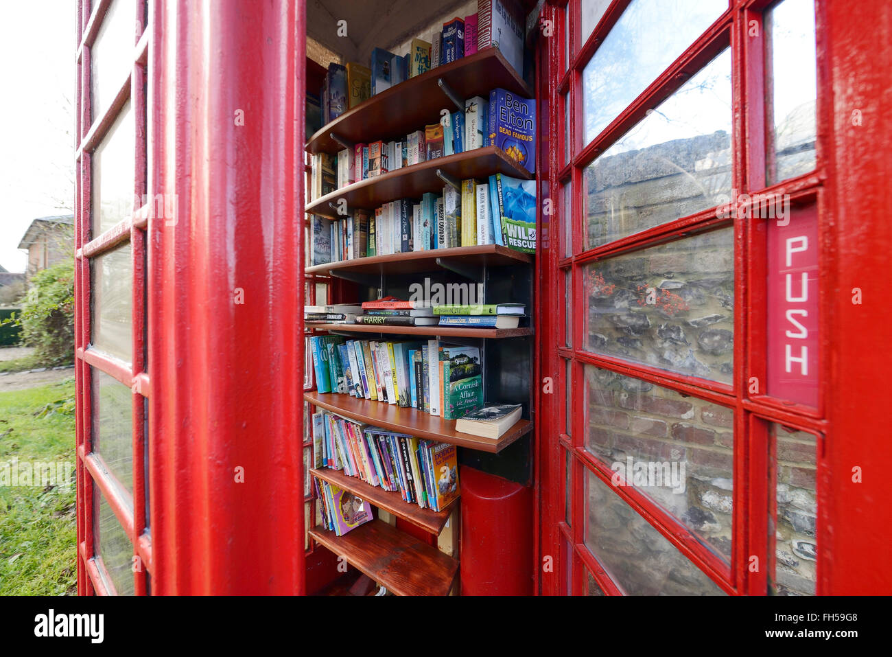 Phone box library in Over Wallop Hampshire UK Stock Photo