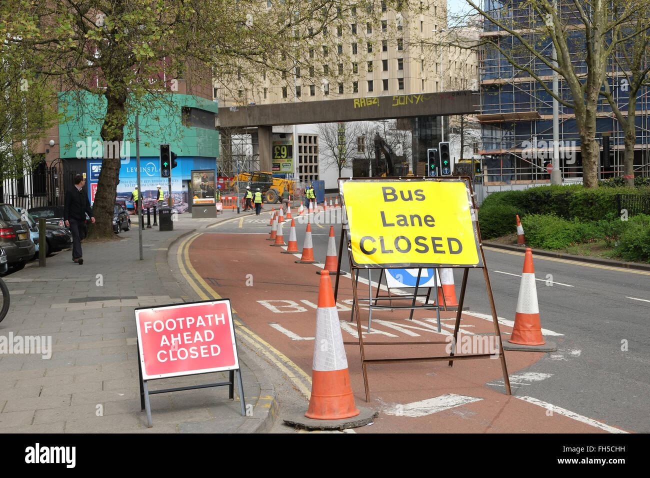 Bus lane and footpath ahead closed signs in Central Bristol, prior to the removal of the 1960's concrete bridge. 17th April 2015 Stock Photo