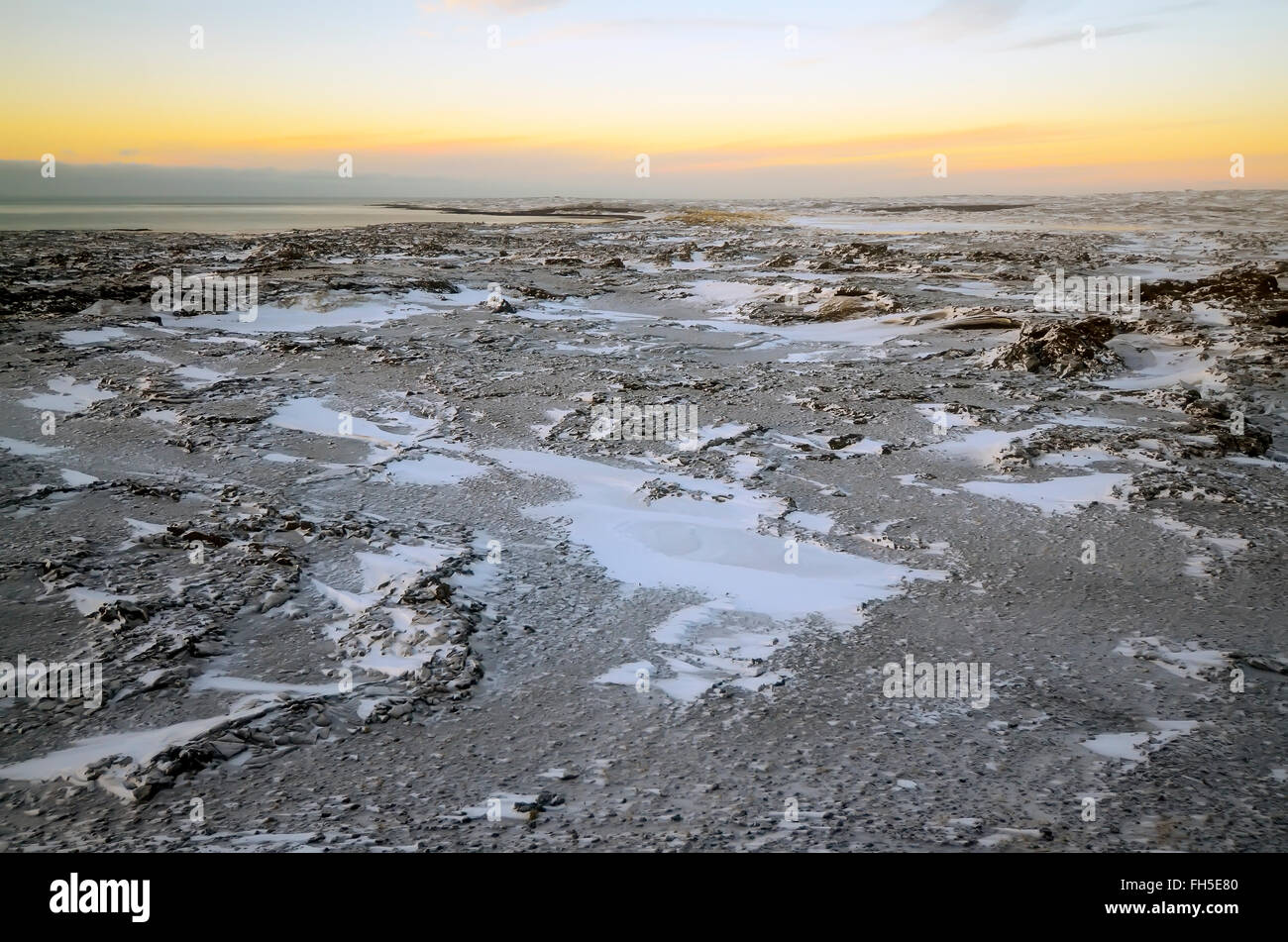 Reykjanes Peninsula Iceland Winter scene  of  desolate black and white lava fields with color sky Stock Photo