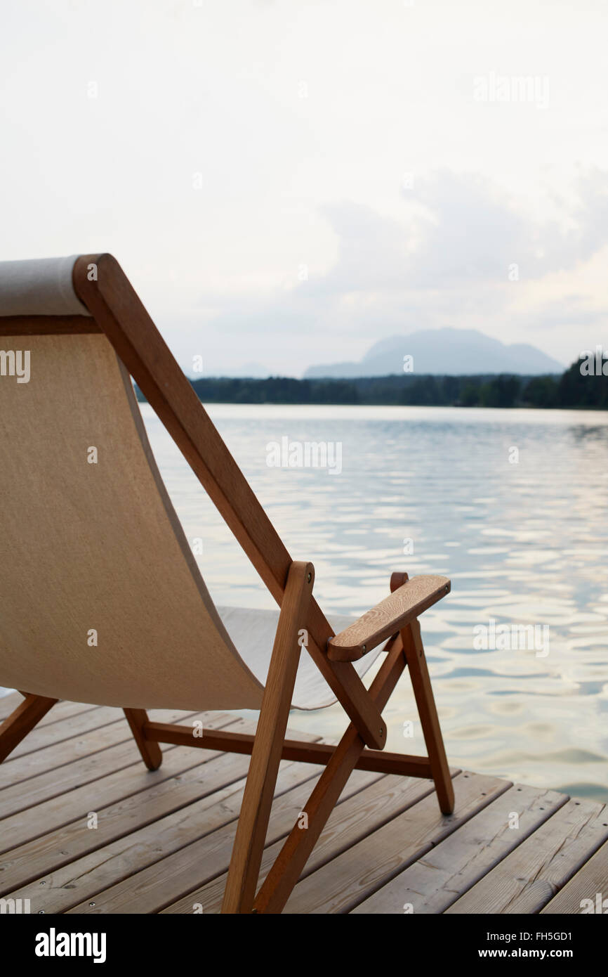 Deck Chair on Dock, Faaker See, Carinthia, Austria Stock Photo