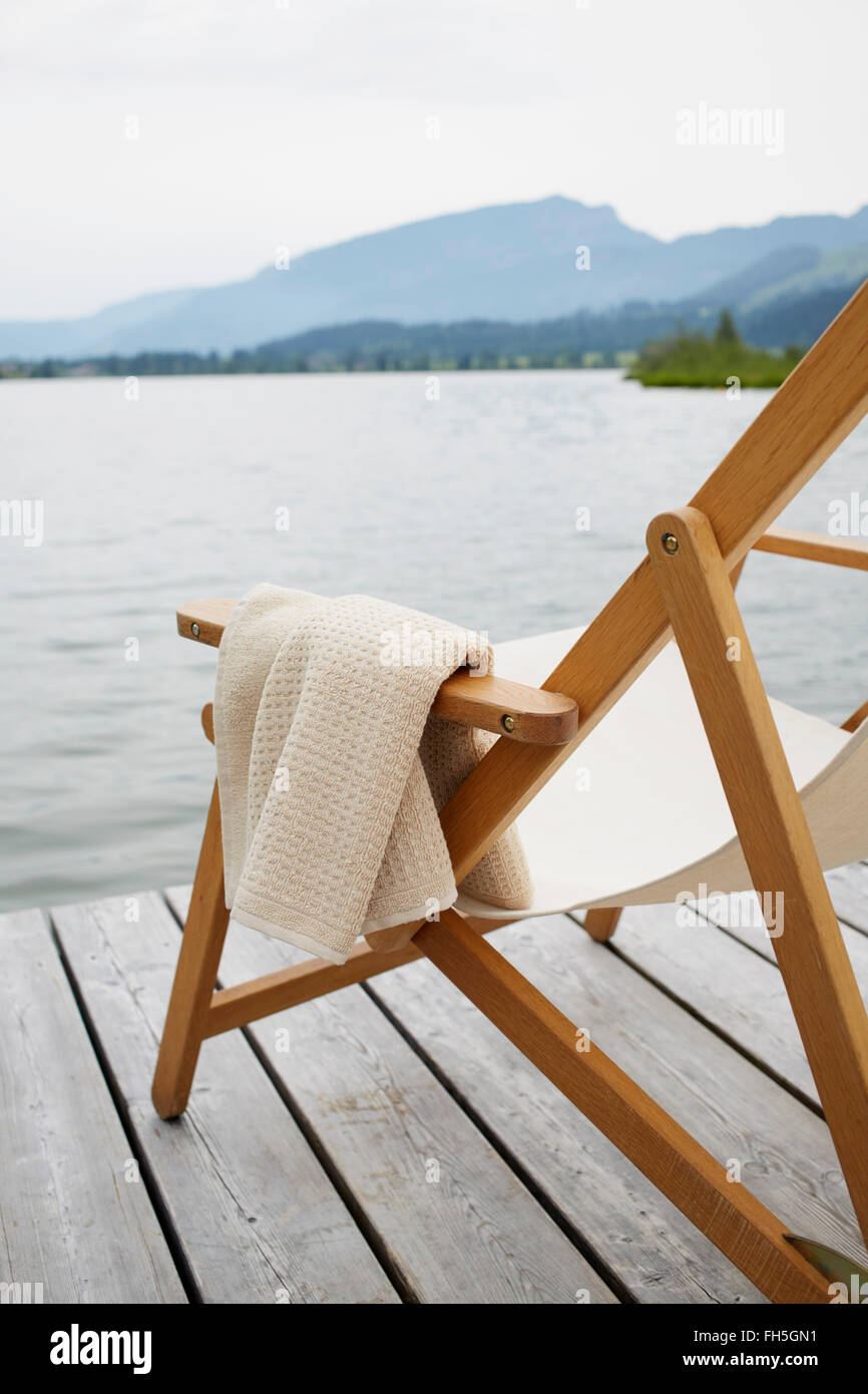 Deck Chair with Towel on Dock, Tirol, Austria Stock Photo