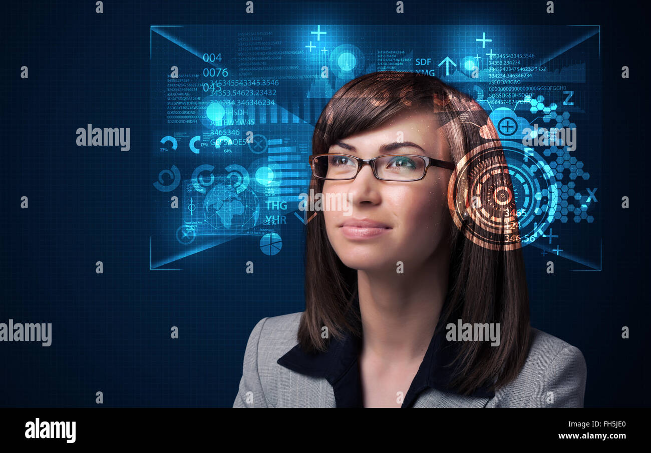 Young woman looking with futuristic smart high tech glasses Stock Photo