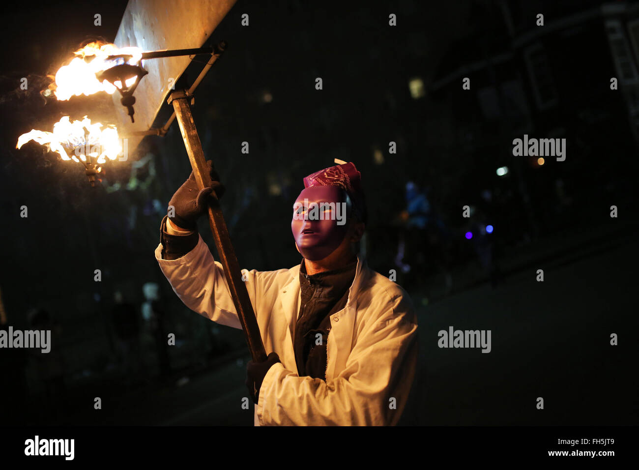 New Orleans, LOUISIANA, USA. 8th Feb, 2016. A flambeaux marches in the ...