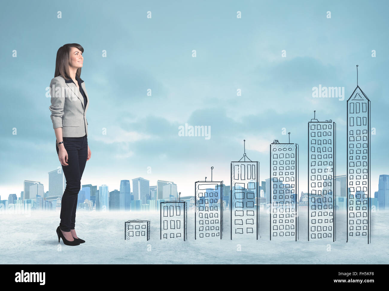 Business woman climbing up on hand drawn buildings in city Stock Photo
