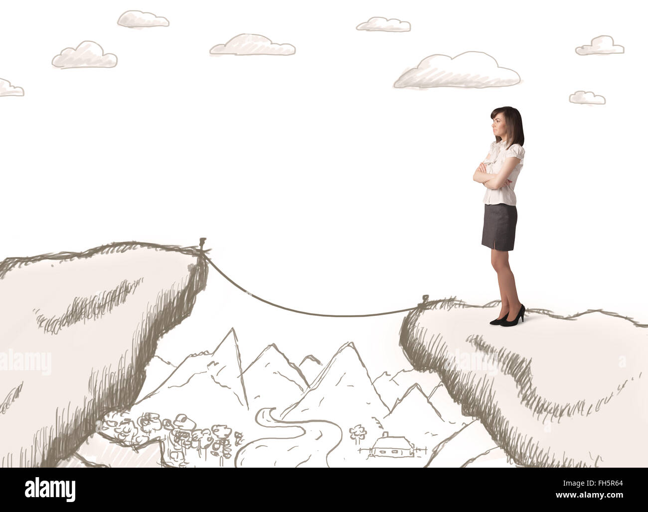 Businesswoman with drawn edge of mountain Stock Photo