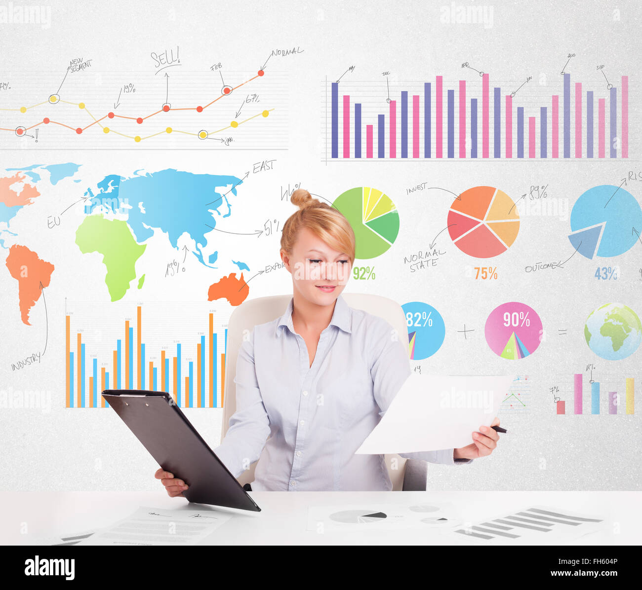 Business woman with colorful charts Stock Photo