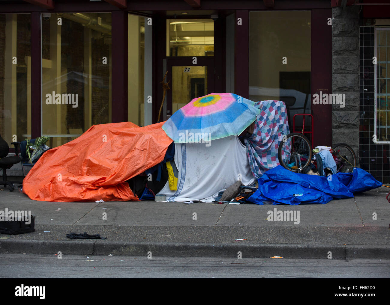 Multiply items used to construct weather protection, Vancouver Downtown Eastside Stock Photo